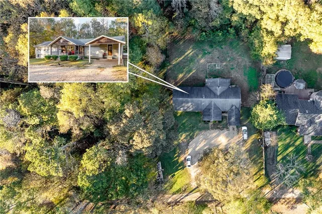 a view of swimming pool with a yard