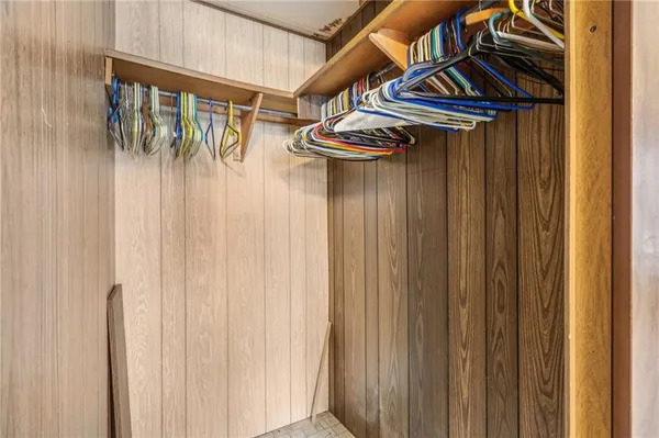 a view of a wooden deck and a yard