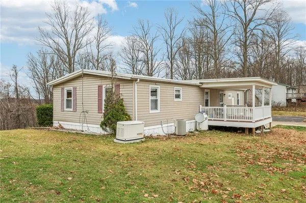 a house view with a garden space