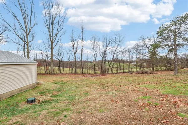 a view of a door with wooden walls