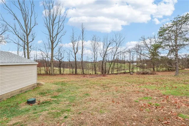 a view of a door with wooden walls