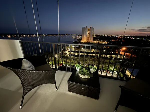 a view of a chairs and tables in the kitchen