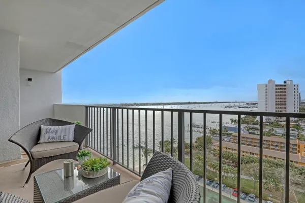 a balcony with furniture
