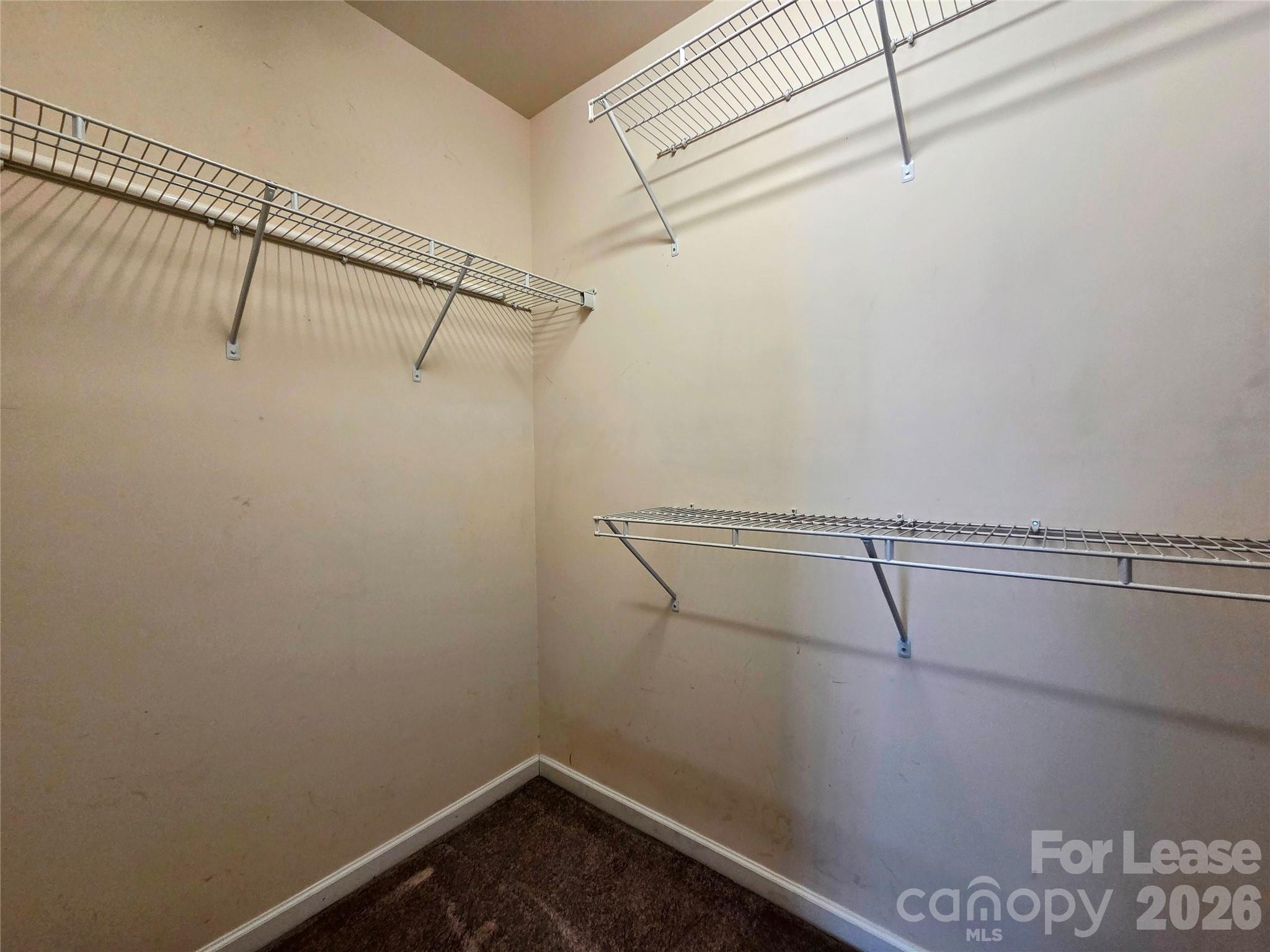 1114 Drayton Court Fort Mill, SC 29708 - Photo 16 of 31 a view of a room with racks on the wall