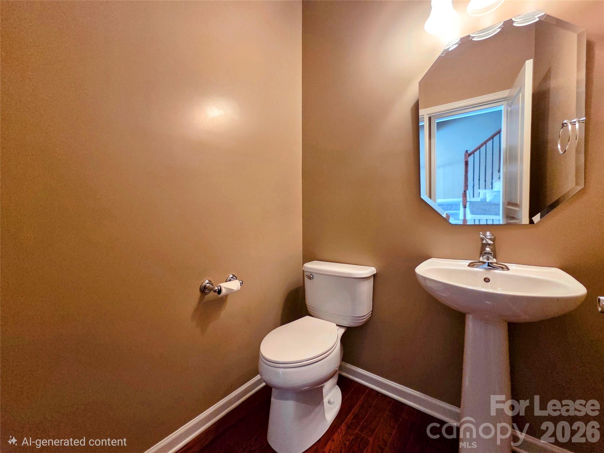 1114 Drayton Court Fort Mill, SC 29708 - Photo 23 of 31 a bathroom with a toilet a sink and mirror