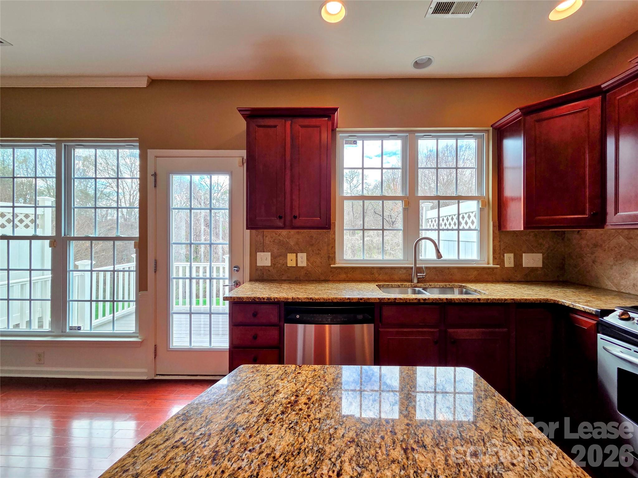 1114 Drayton Court Fort Mill, SC 29708 - Photo 9 of 31 a kitchen with a sink and large window