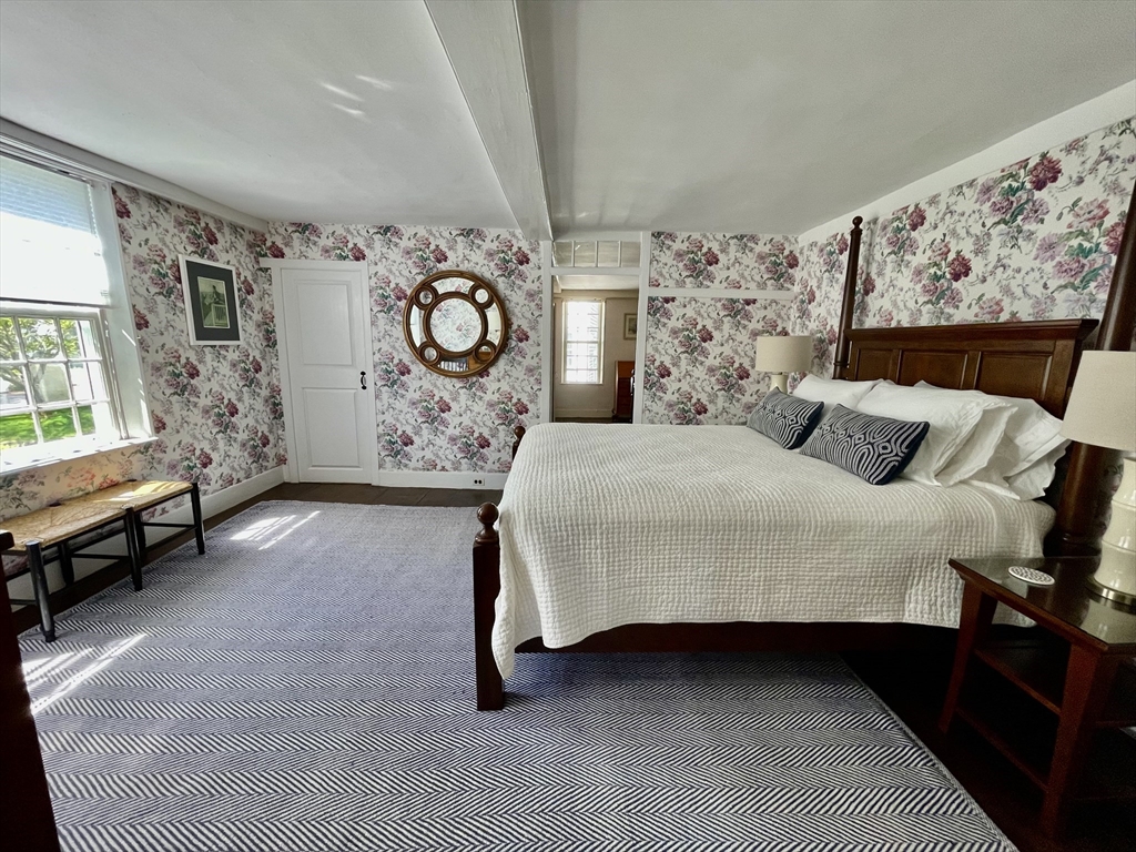 4 Traders Lane Nantucket, MA 02554 - Photo 9 of 15 a bedroom with a bed and a window