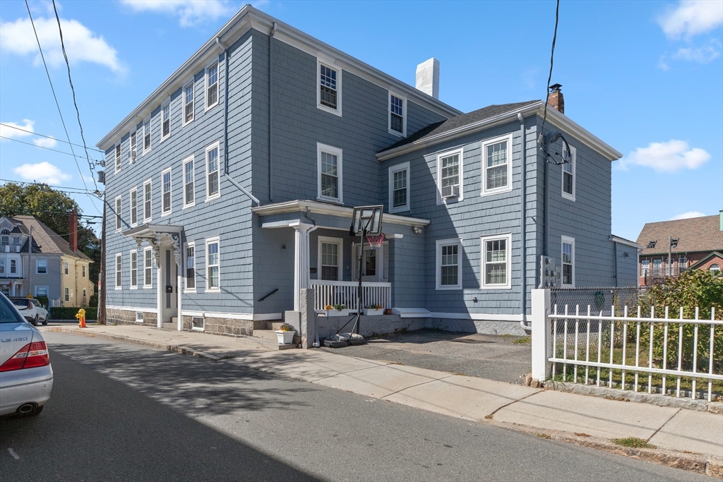40 Middle Street, Unit 2 Gloucester, MA 01930 - Photo 1 of 21 a view of a house with a street