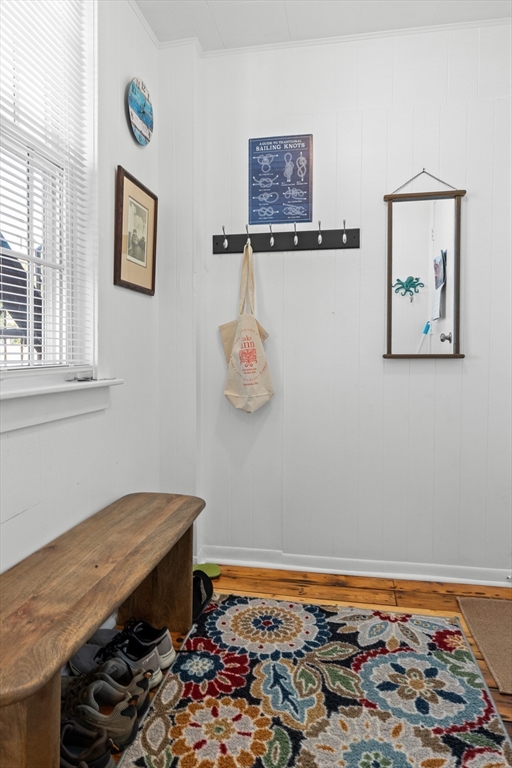 40 Middle Street, Unit 2 Gloucester, MA 01930 - Photo 13 of 21 a room with painting on the wall and a window