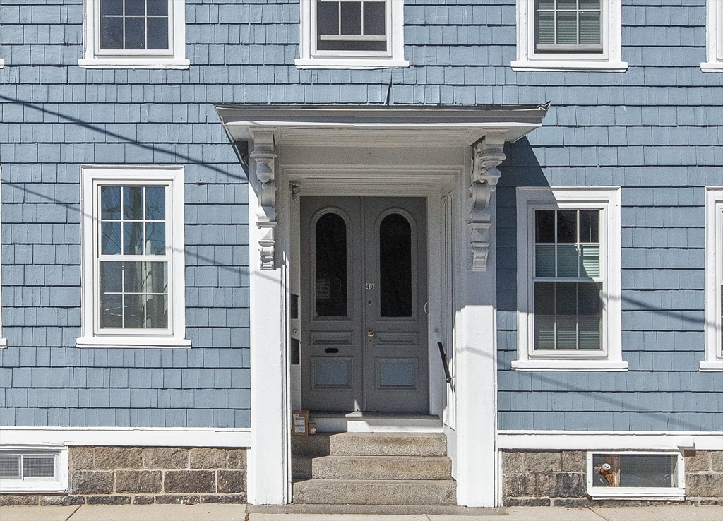40 Middle Street, Unit 2 Gloucester, MA 01930 - Photo 2 of 21 a front view of a house with a door