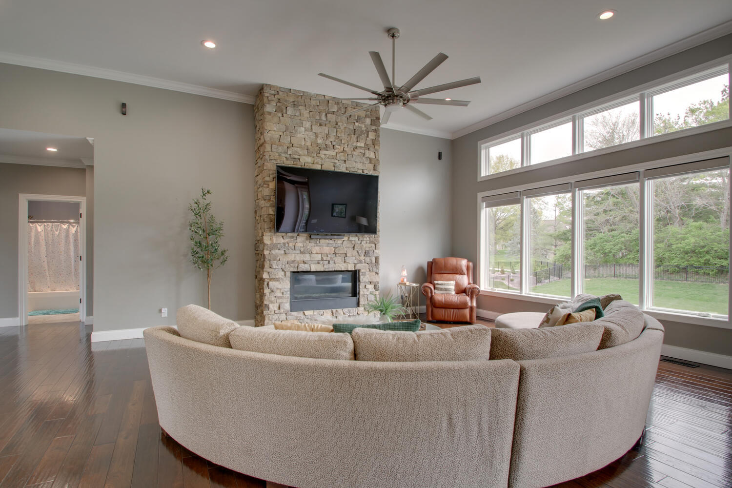 4432 Bryant Drive Quincy, IL 62305 - Photo 12 of 30 a living room with furniture a fireplace and a large window