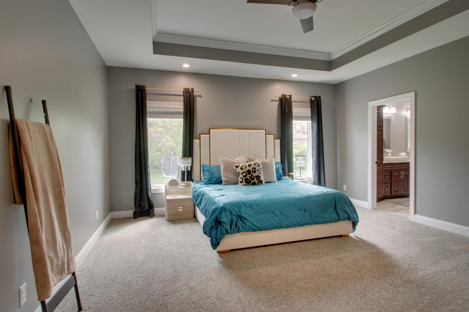 4432 Bryant Drive Quincy, IL 62305 - Photo 17 of 30 a bedroom with a large bed and a refrigerator