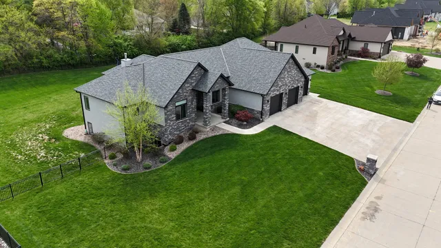 an aerial view of a house with garden