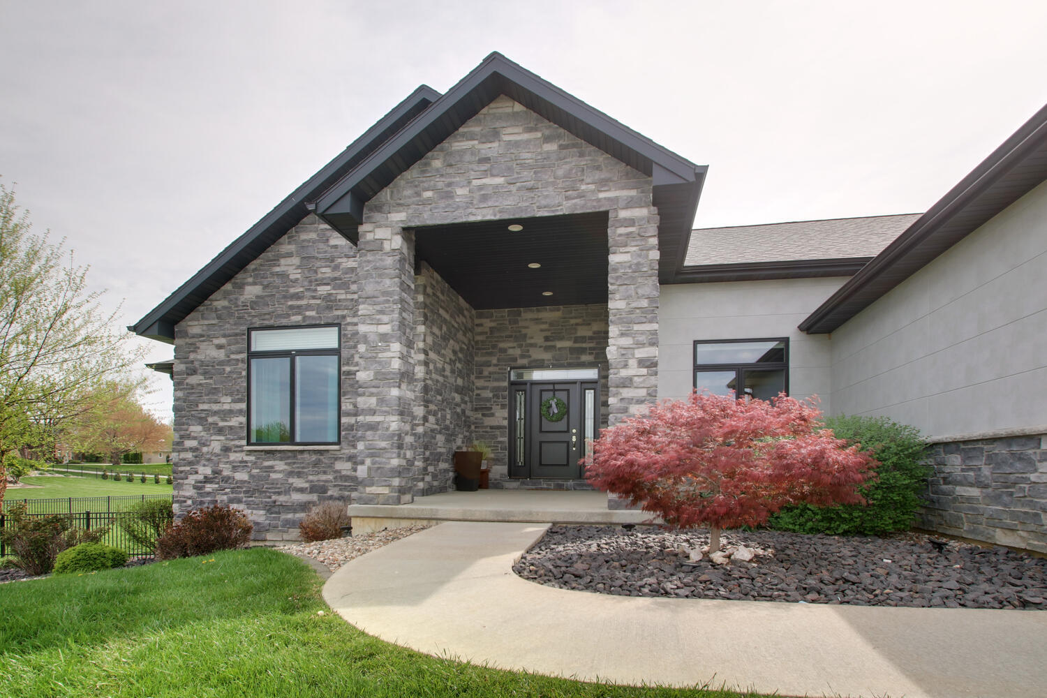 4432 Bryant Drive Quincy, IL 62305 - Photo 9 of 30 a front view of a house with garden