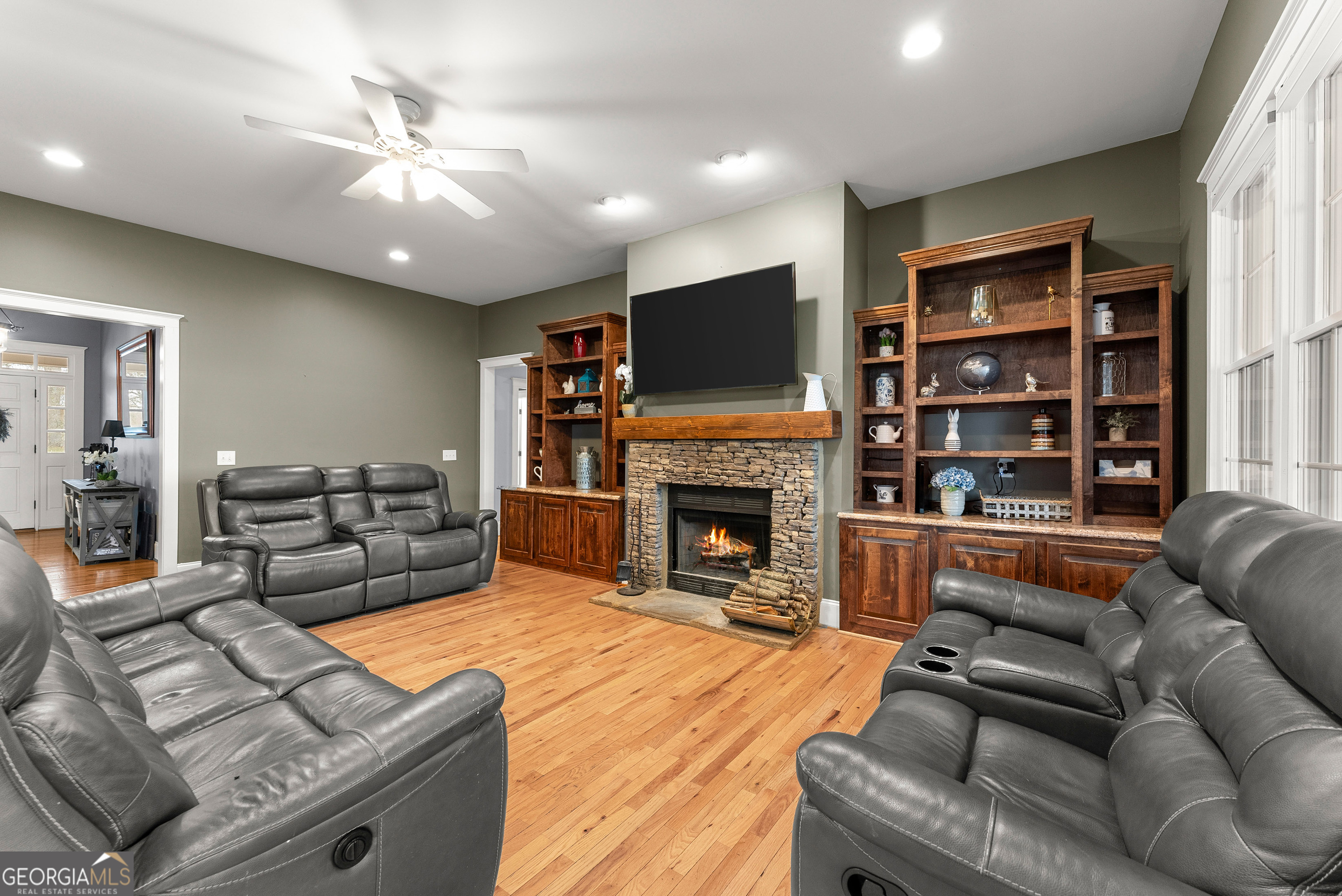 1295 Wall Bridge Loop Clarkesville, GA 30523 - Photo 13 of 76 a living room with furniture fireplace and flat screen tv