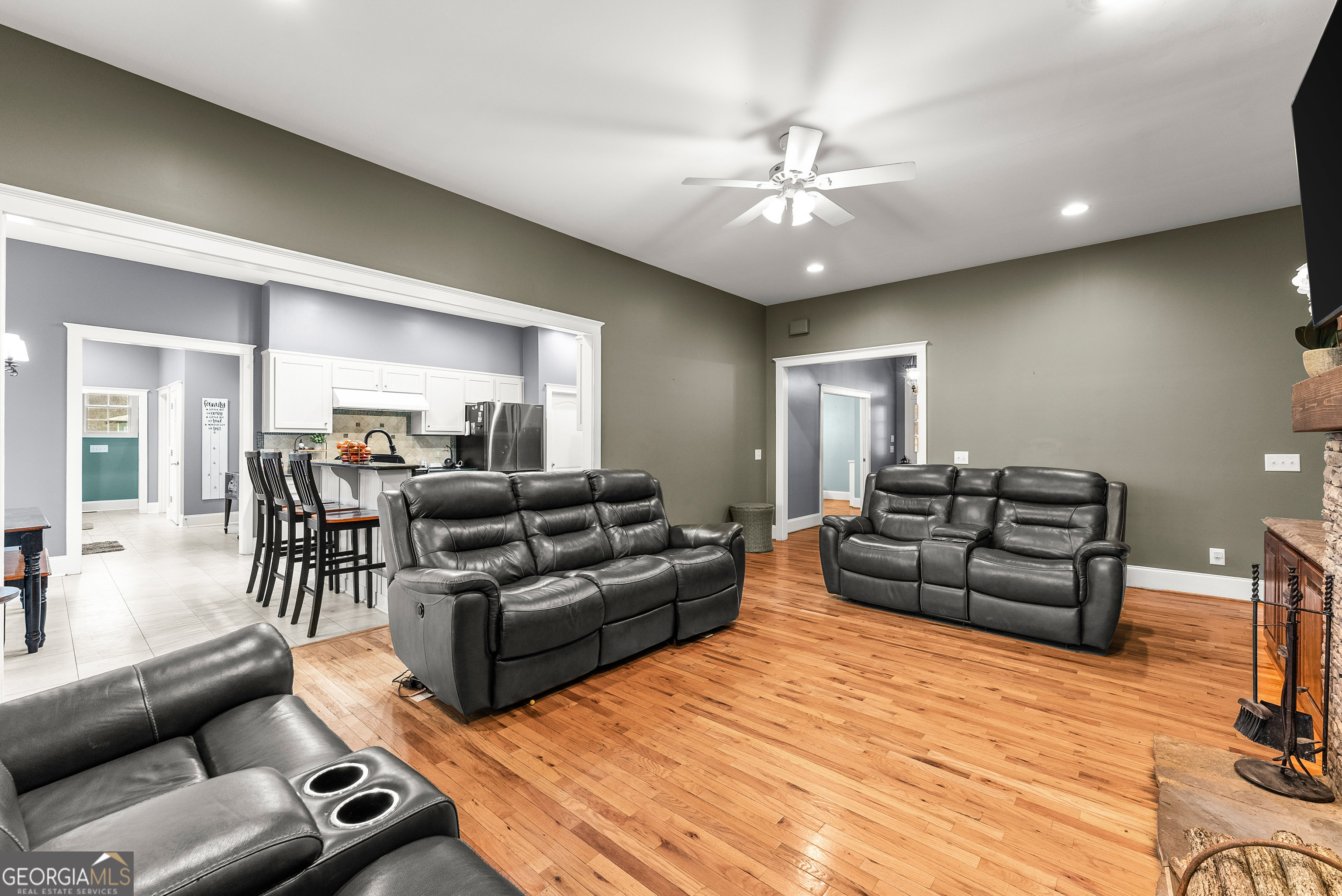1295 Wall Bridge Loop Clarkesville, GA 30523 - Photo 15 of 76 a living room with furniture and wooden floor