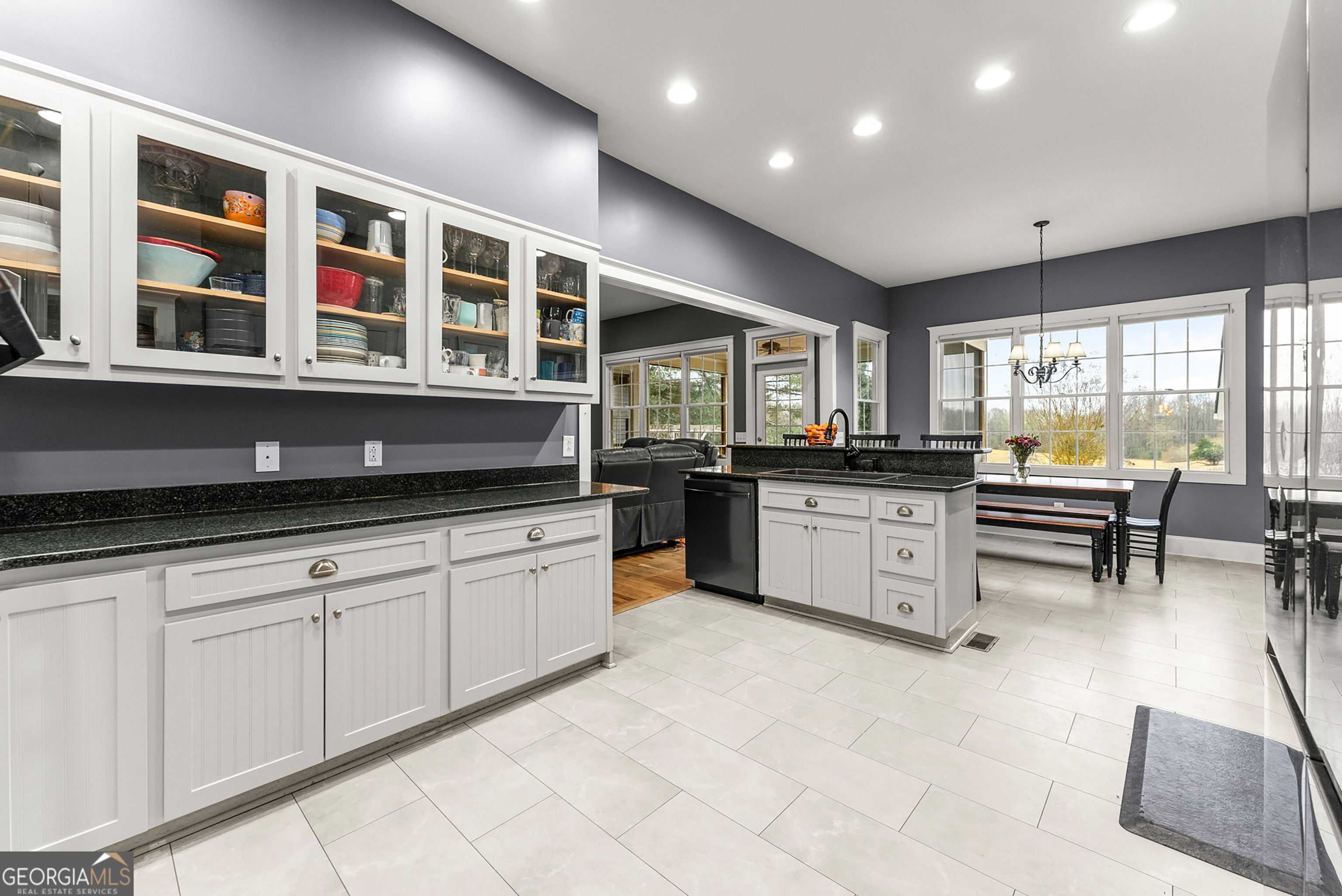 1295 Wall Bridge Loop Clarkesville, GA 30523 - Photo 19 of 76 a kitchen with stainless steel appliances granite countertop a stove and a sink