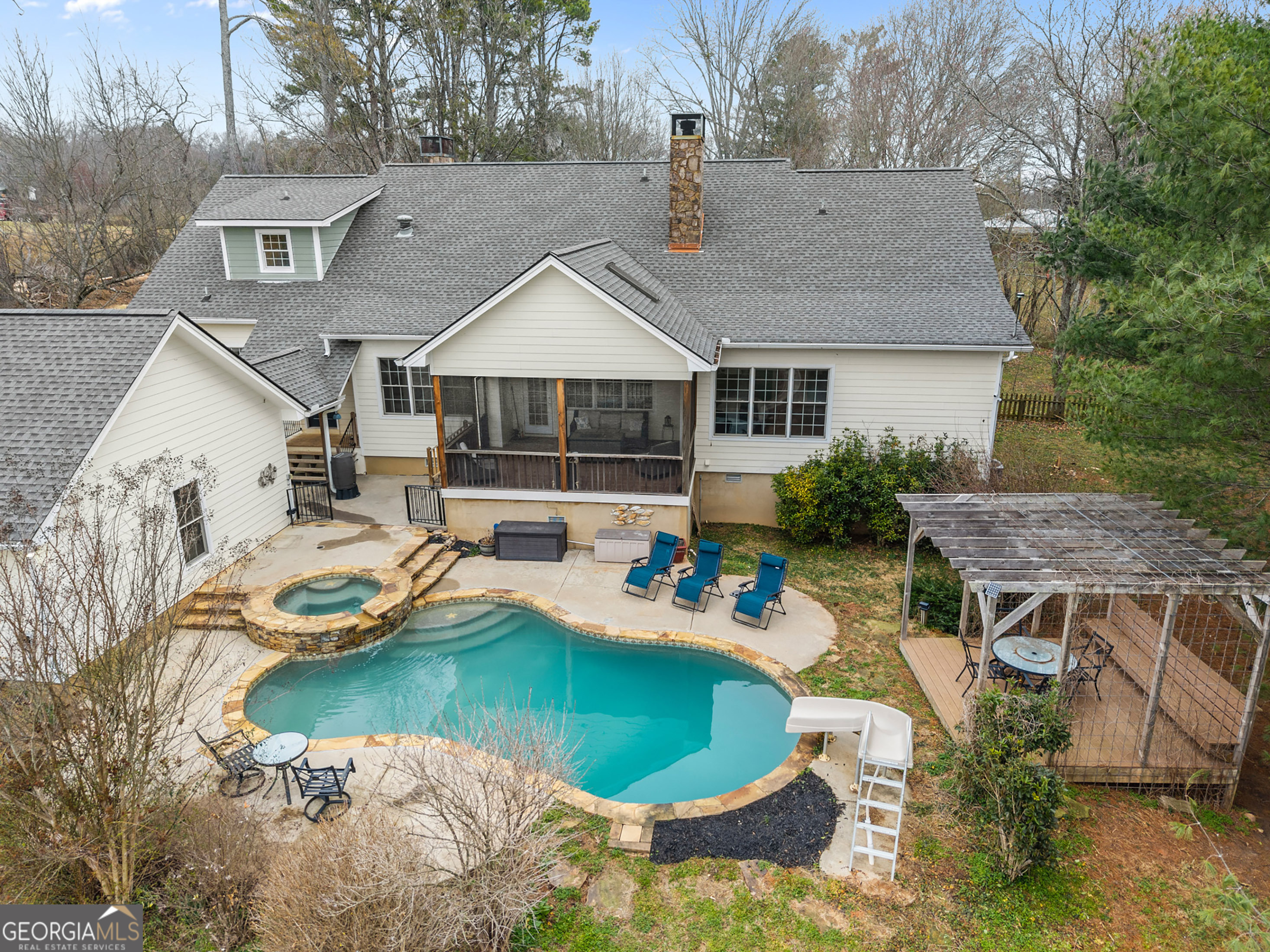 1295 Wall Bridge Loop Clarkesville, GA 30523 - Photo 2 of 76 an aerial view of a house with swimming pool and patio