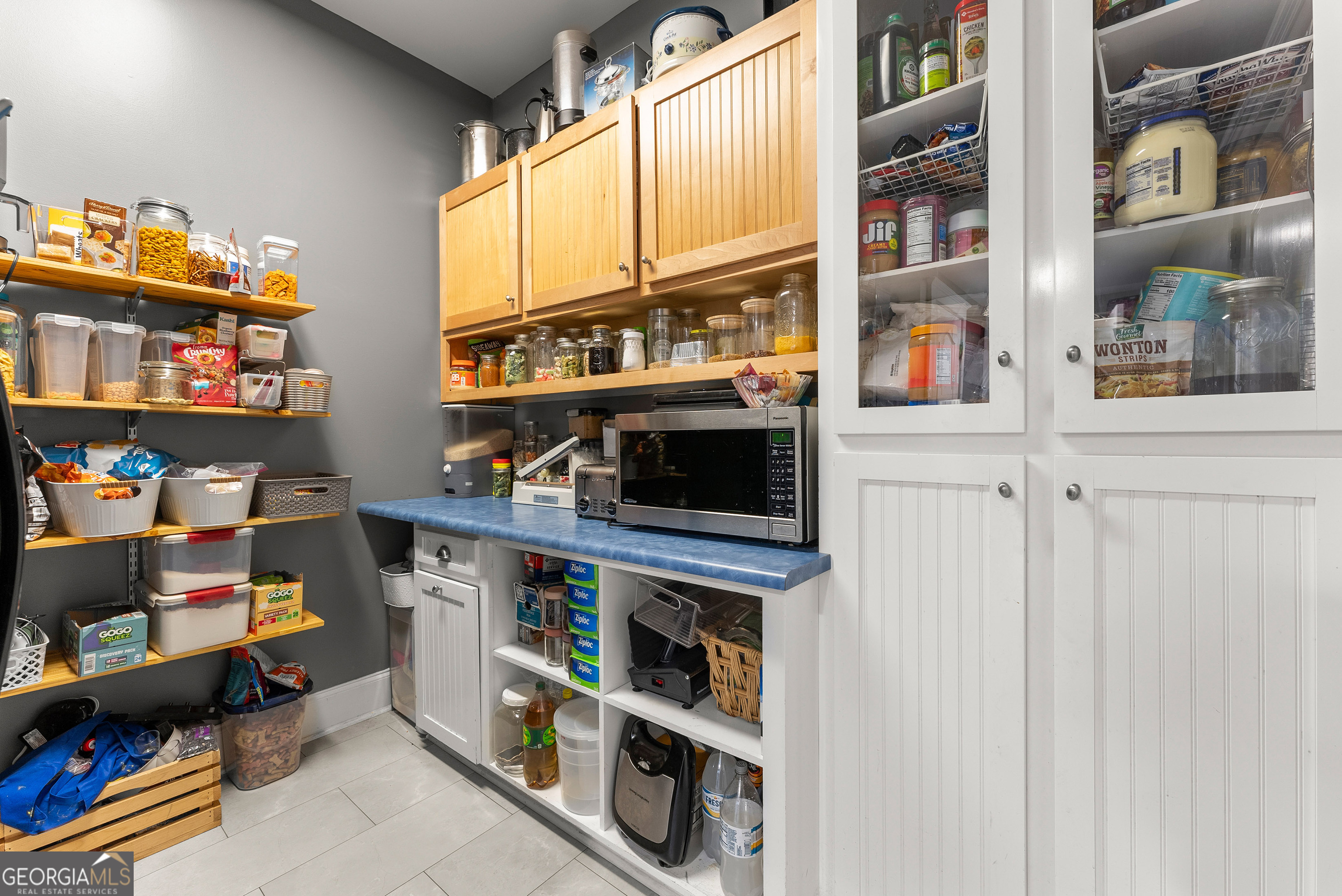 1295 Wall Bridge Loop Clarkesville, GA 30523 - Photo 25 of 76 a view of walk in closet with clothes and shoes