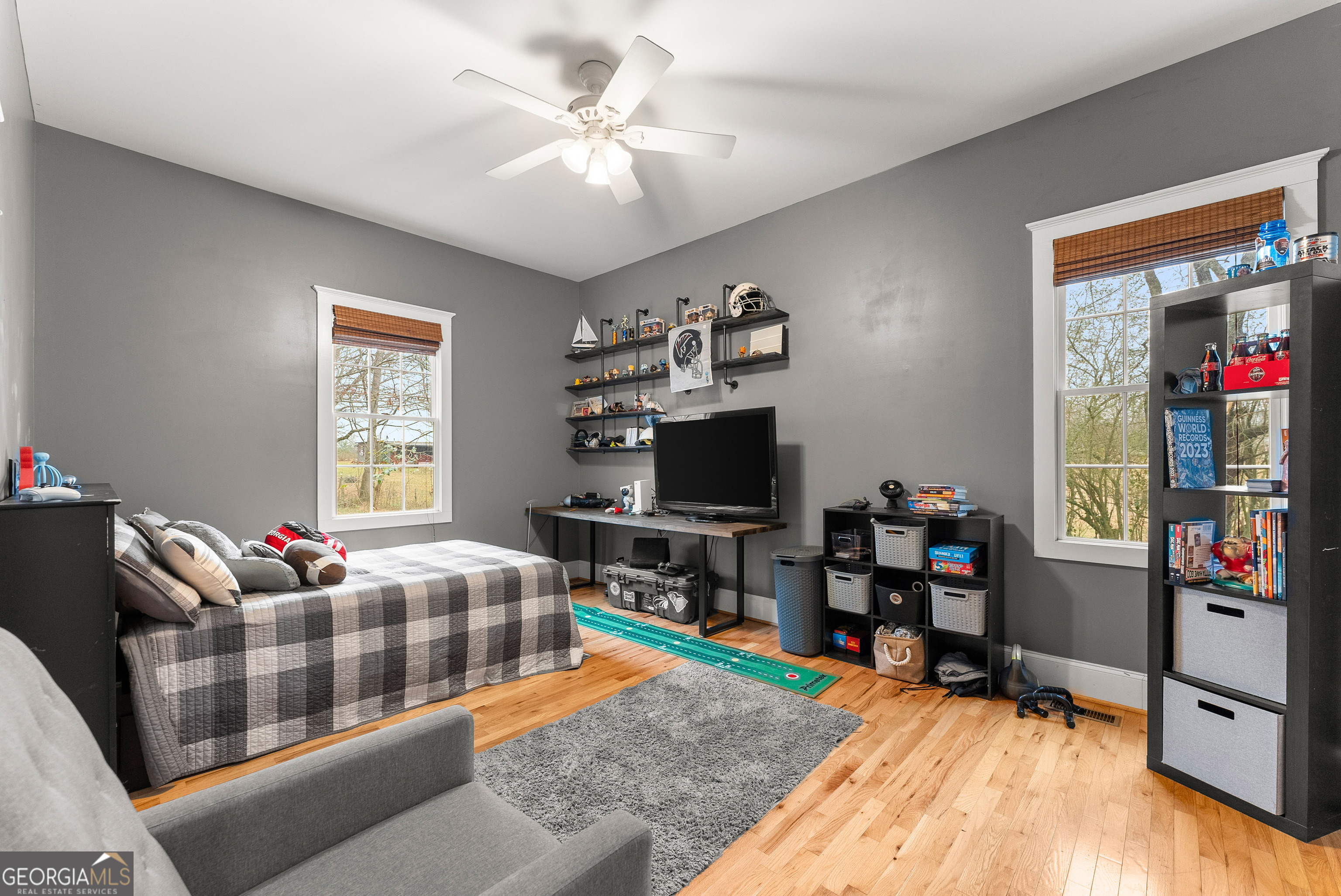 1295 Wall Bridge Loop Clarkesville, GA 30523 - Photo 31 of 76 a living room with furniture and a flat screen tv