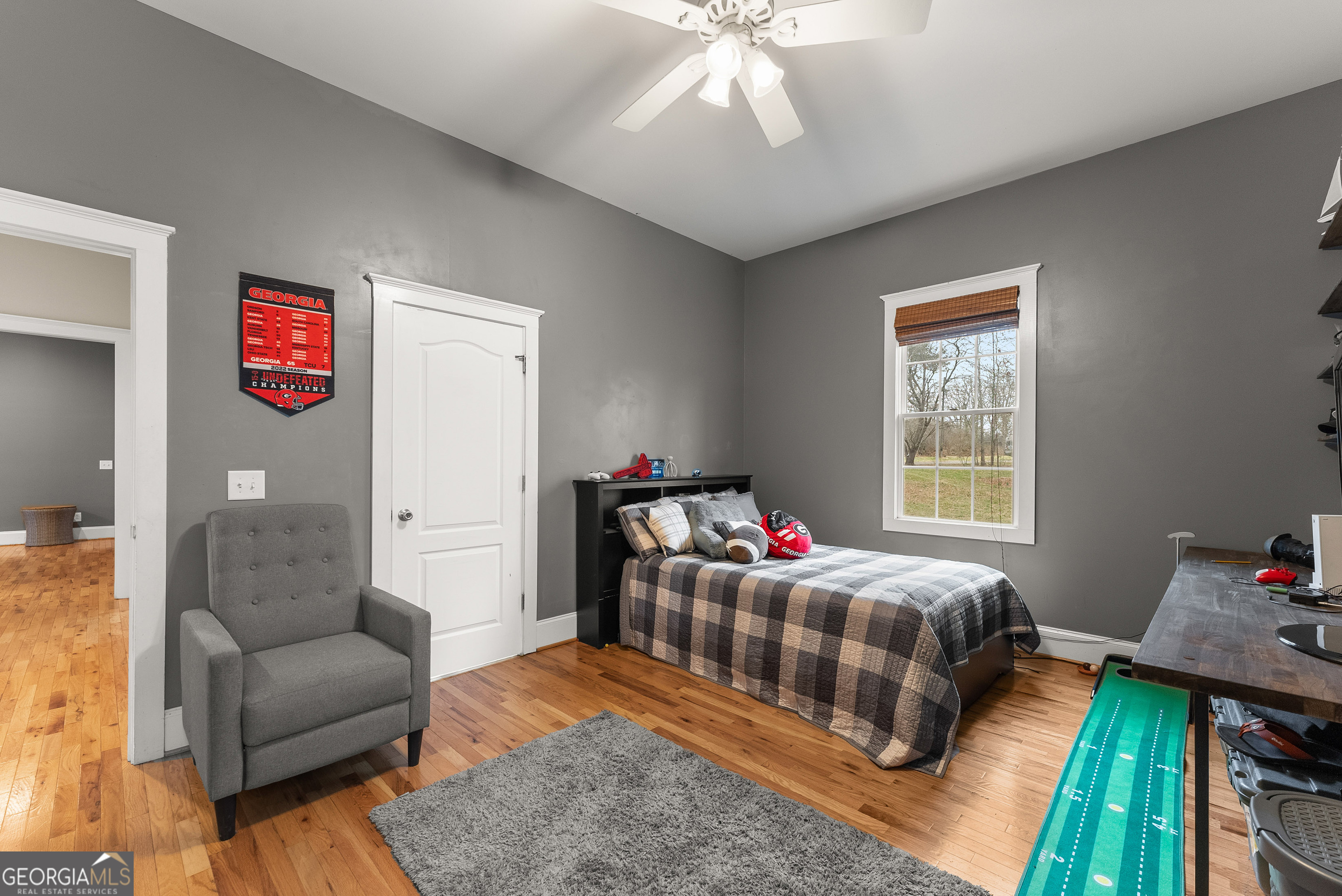 1295 Wall Bridge Loop Clarkesville, GA 30523 - Photo 33 of 76 a bedroom with a bed and a chandelier