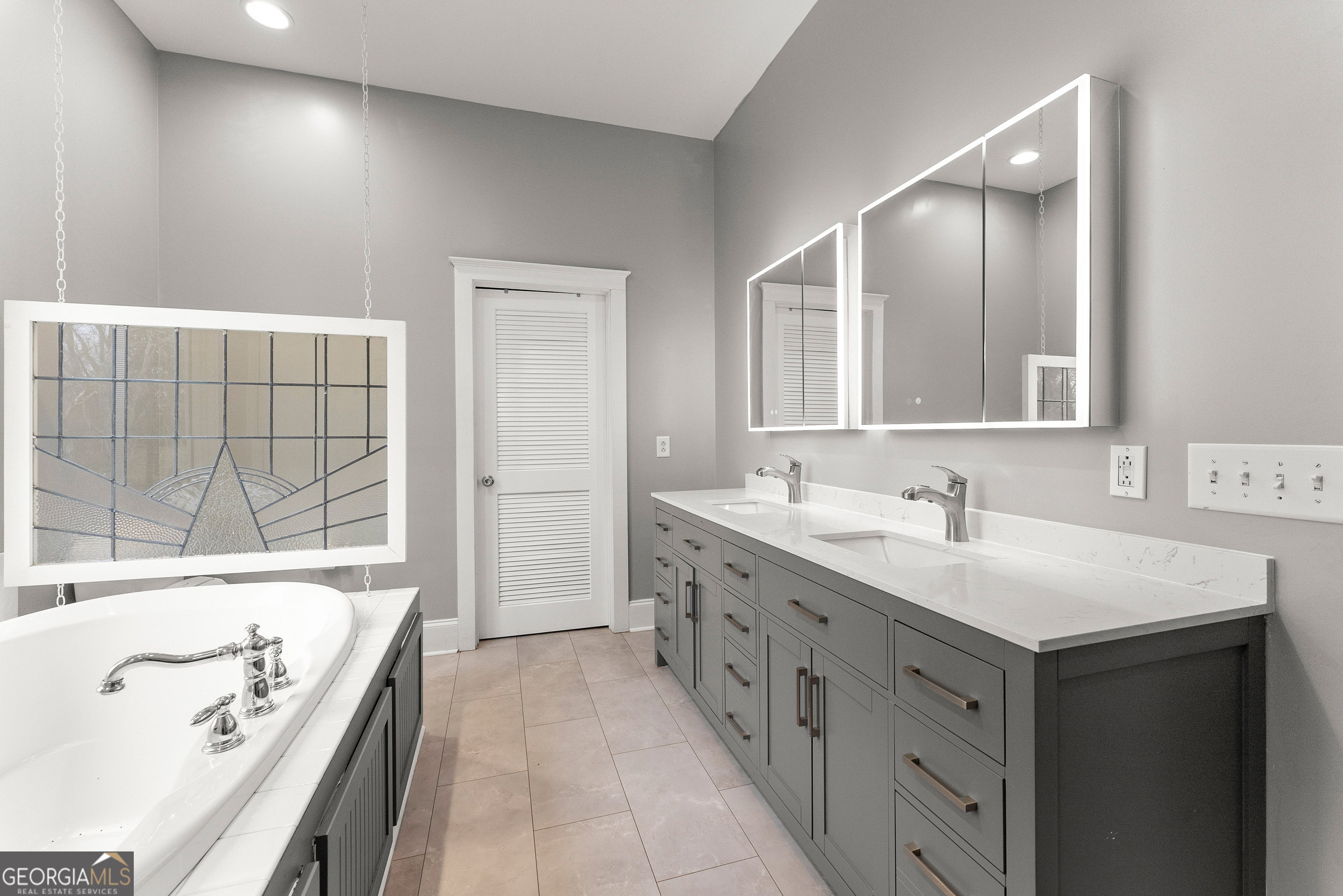 1295 Wall Bridge Loop Clarkesville, GA 30523 - Photo 43 of 76 a bathroom with a tub sink and mirror