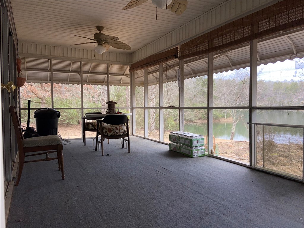 210 North Little River Road Tamassee, SC 29686 - Photo 11 of 39 Screened in porch overlooking pond accessible from