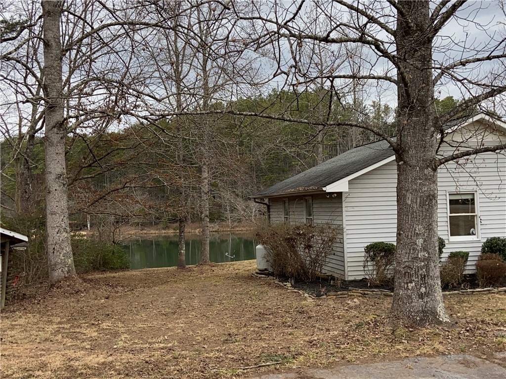 210 North Little River Road Tamassee, SC 29686 - Photo 22 of 39 The pond is only steps away from the home!