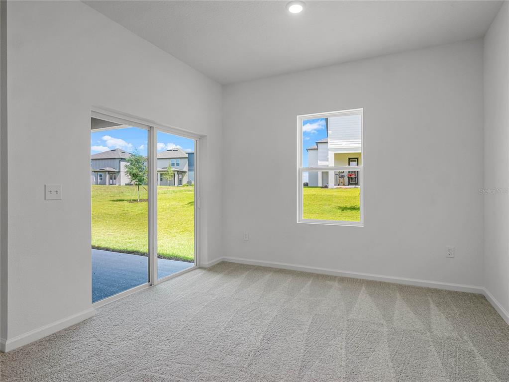 2202 Raven Rdg Road Clermont, FL 34715 - Photo 14 of 37 an empty room with a window