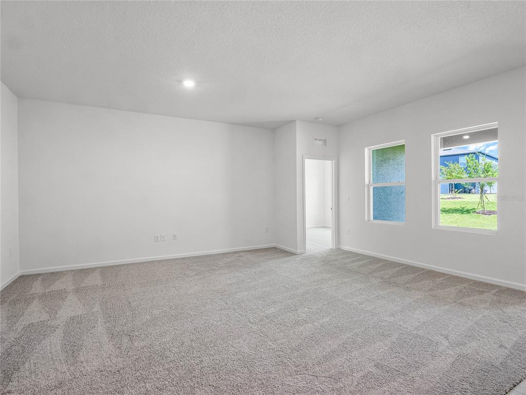 2202 Raven Rdg Road Clermont, FL 34715 - Photo 15 of 37 an empty room with windows
