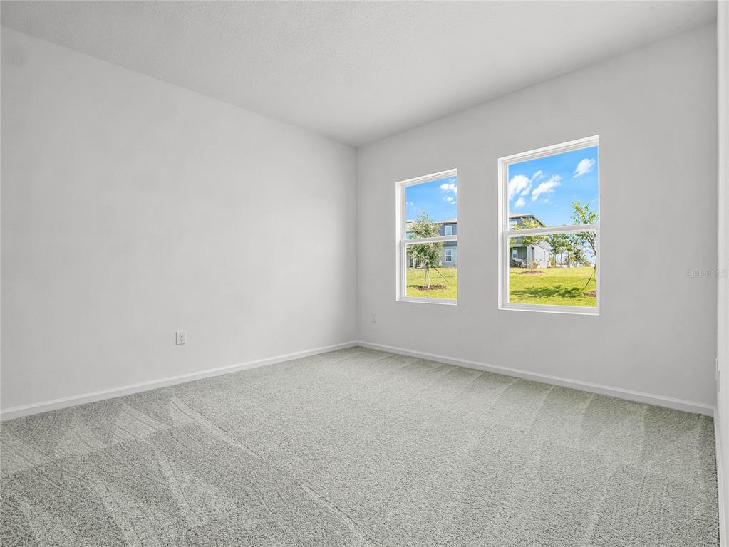 2202 Raven Rdg Road Clermont, FL 34715 - Photo 16 of 37 an empty room with windows