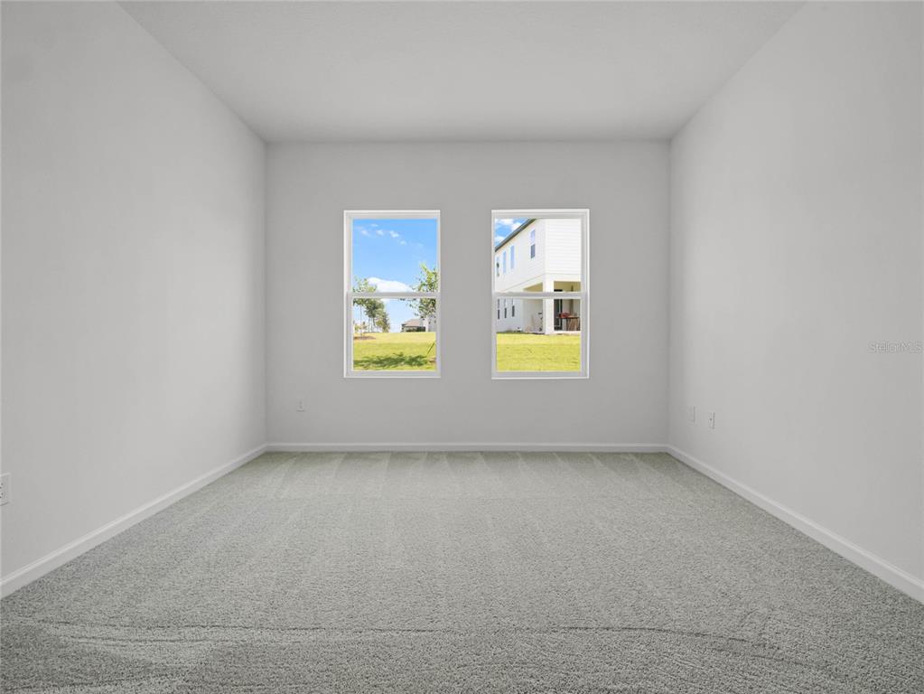 2202 Raven Rdg Road Clermont, FL 34715 - Photo 17 of 37 a view of an empty room with a window