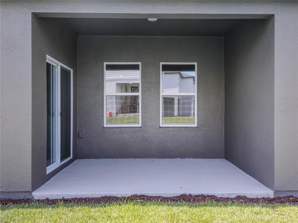 2202 Raven Rdg Road Clermont, FL 34715 - Photo 26 of 37 a view of an empty room with windows