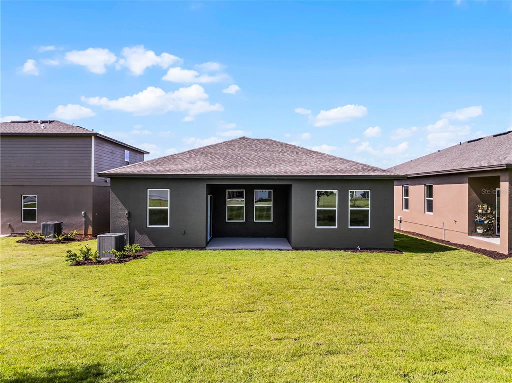 2202 Raven Rdg Road Clermont, FL 34715 - Photo 29 of 37 a view of a yard in front of a house
