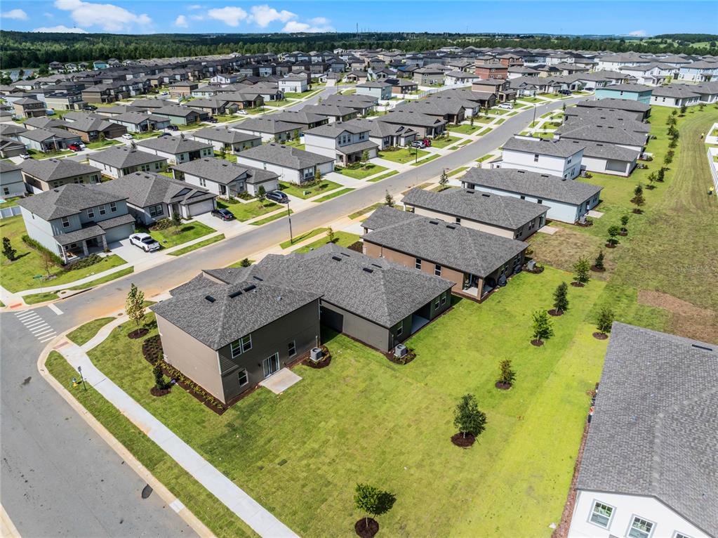 2202 Raven Rdg Road Clermont, FL 34715 - Photo 32 of 37 an aerial view of residential houses with outdoor space