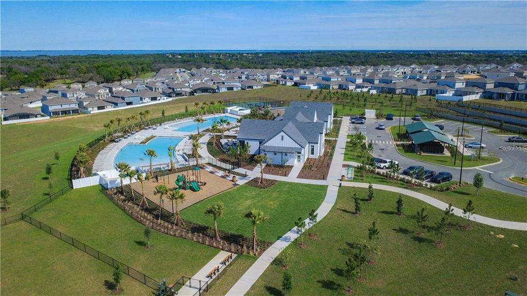 2202 Raven Rdg Road Clermont, FL 34715 - Photo 34 of 37 an aerial view of a house with a swimming pool