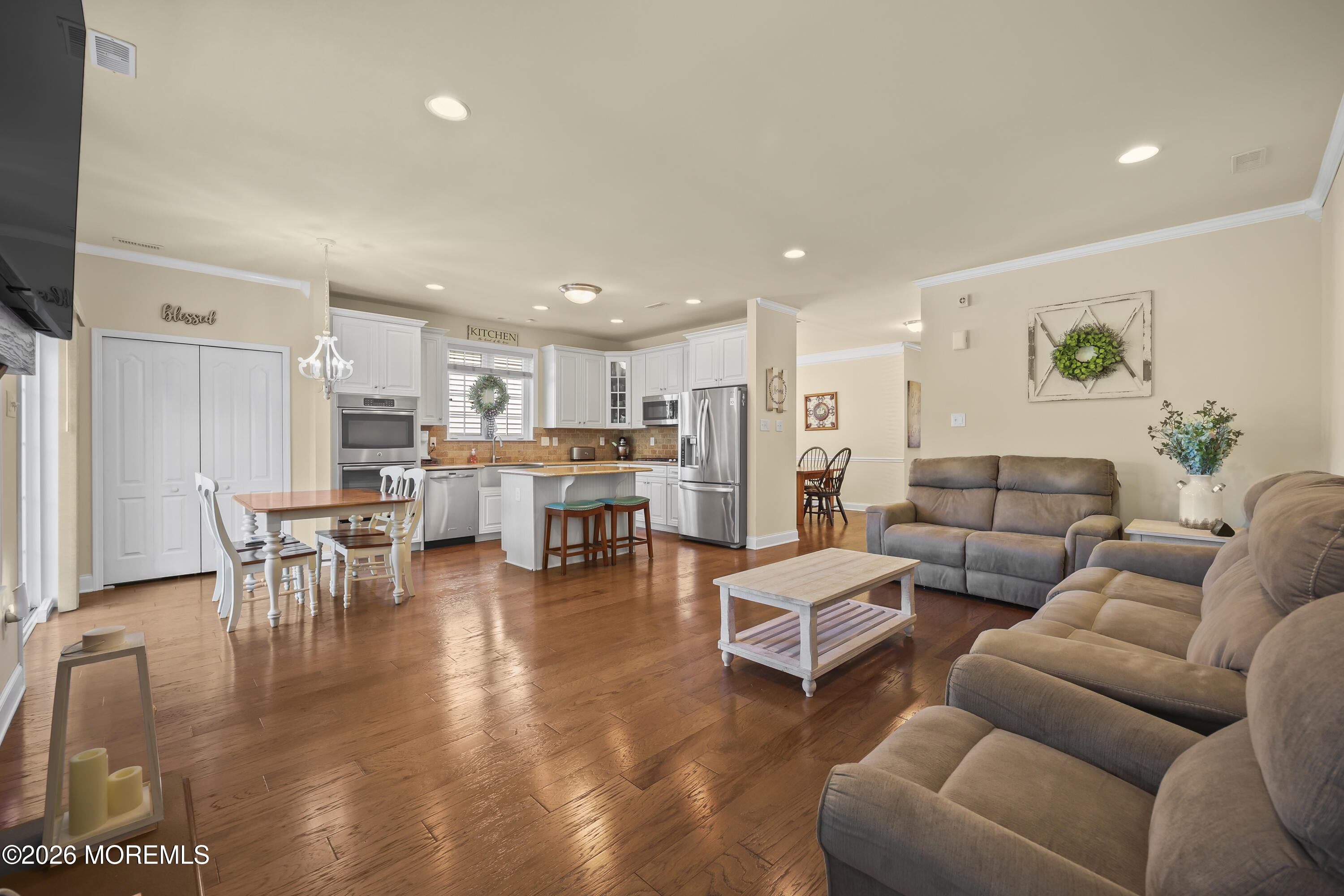 51 Mason Drive Jackson, NJ 08527 - Photo 11 of 39 a living room with furniture and kitchen view
