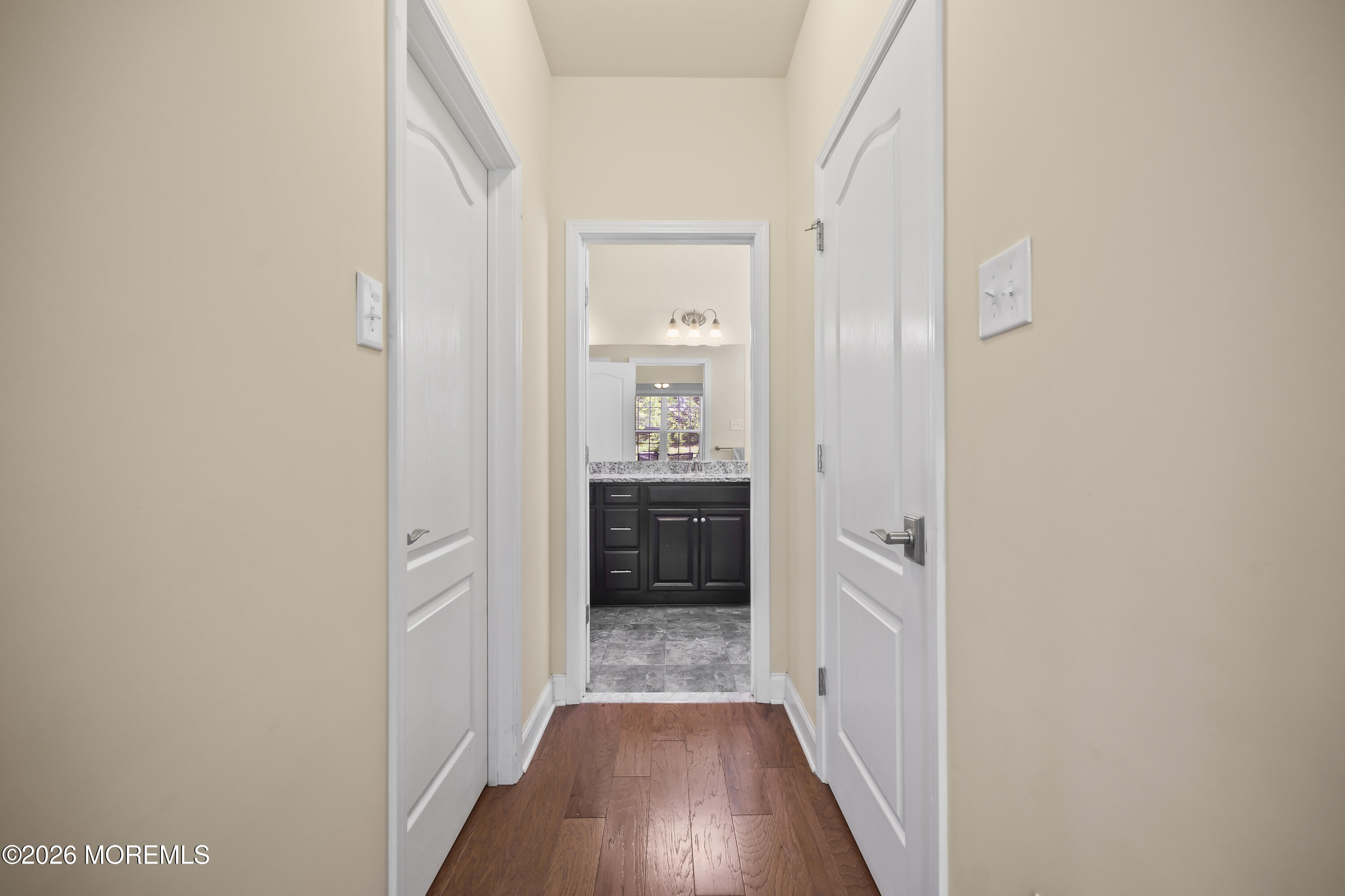 51 Mason Drive Jackson, NJ 08527 - Photo 18 of 39 a view of a hallway with wooden floor