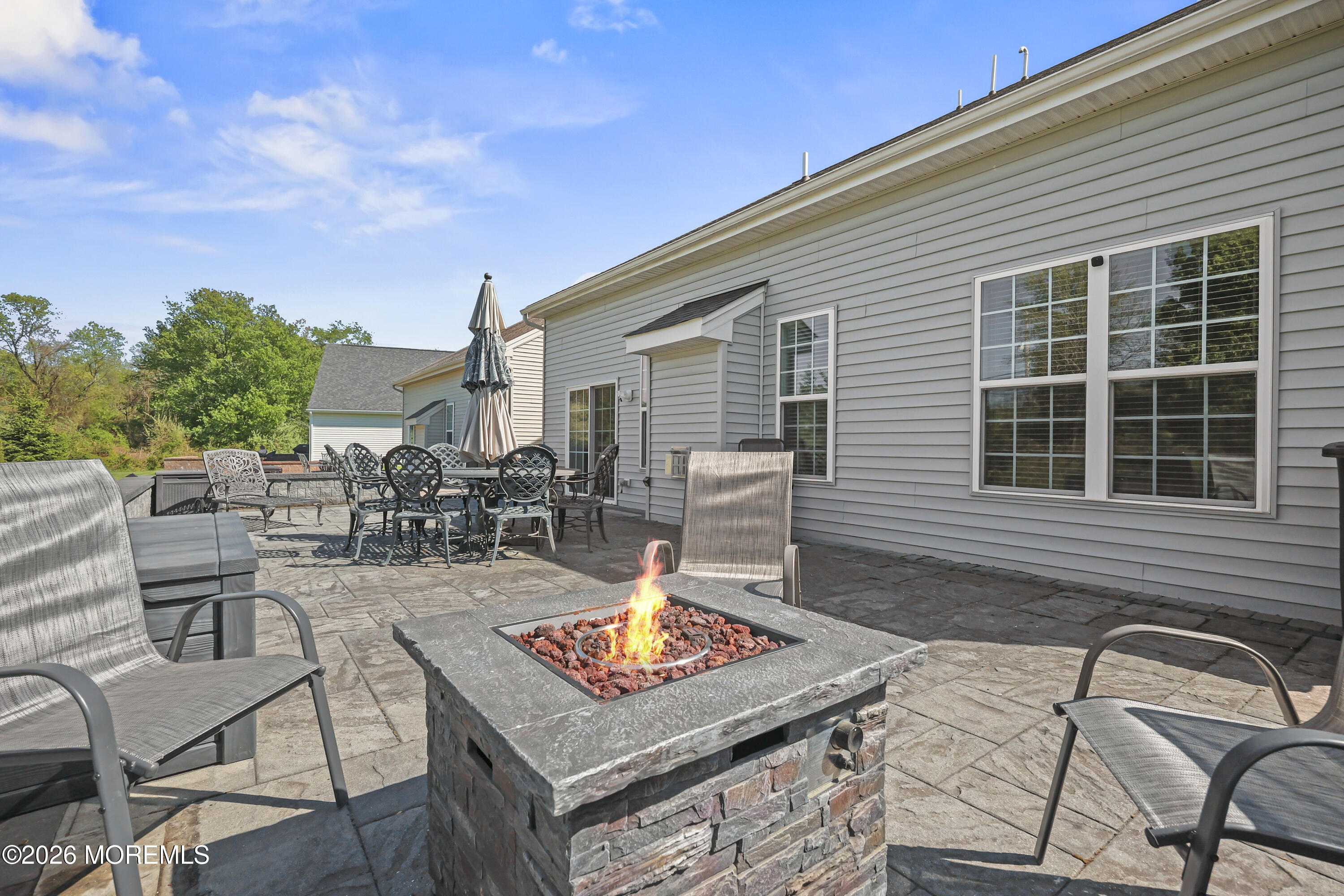 51 Mason Drive Jackson, NJ 08527 - Photo 24 of 39 a backyard of a house with seating space