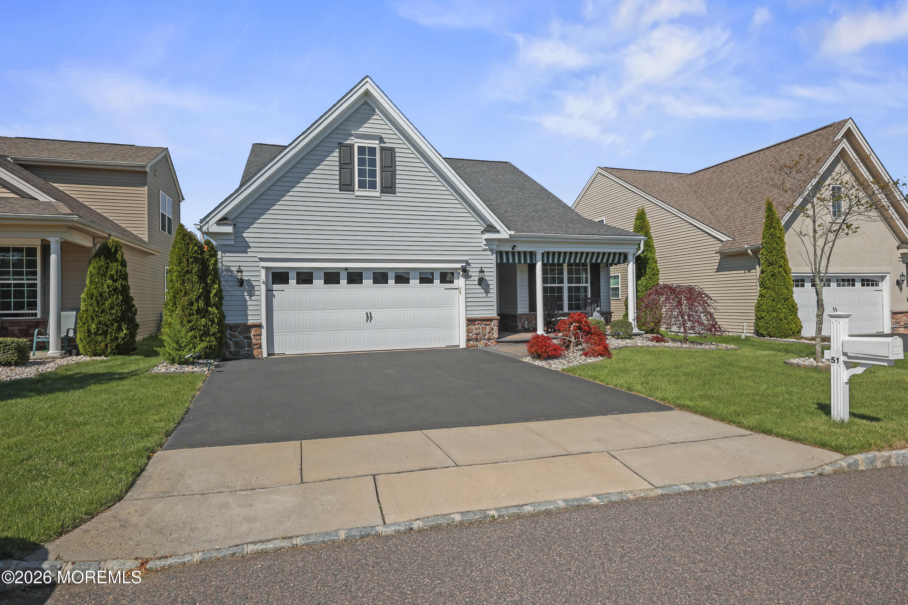 51 Mason Drive Jackson, NJ 08527 - Photo 28 of 39 a front view of a house with a yard and garage