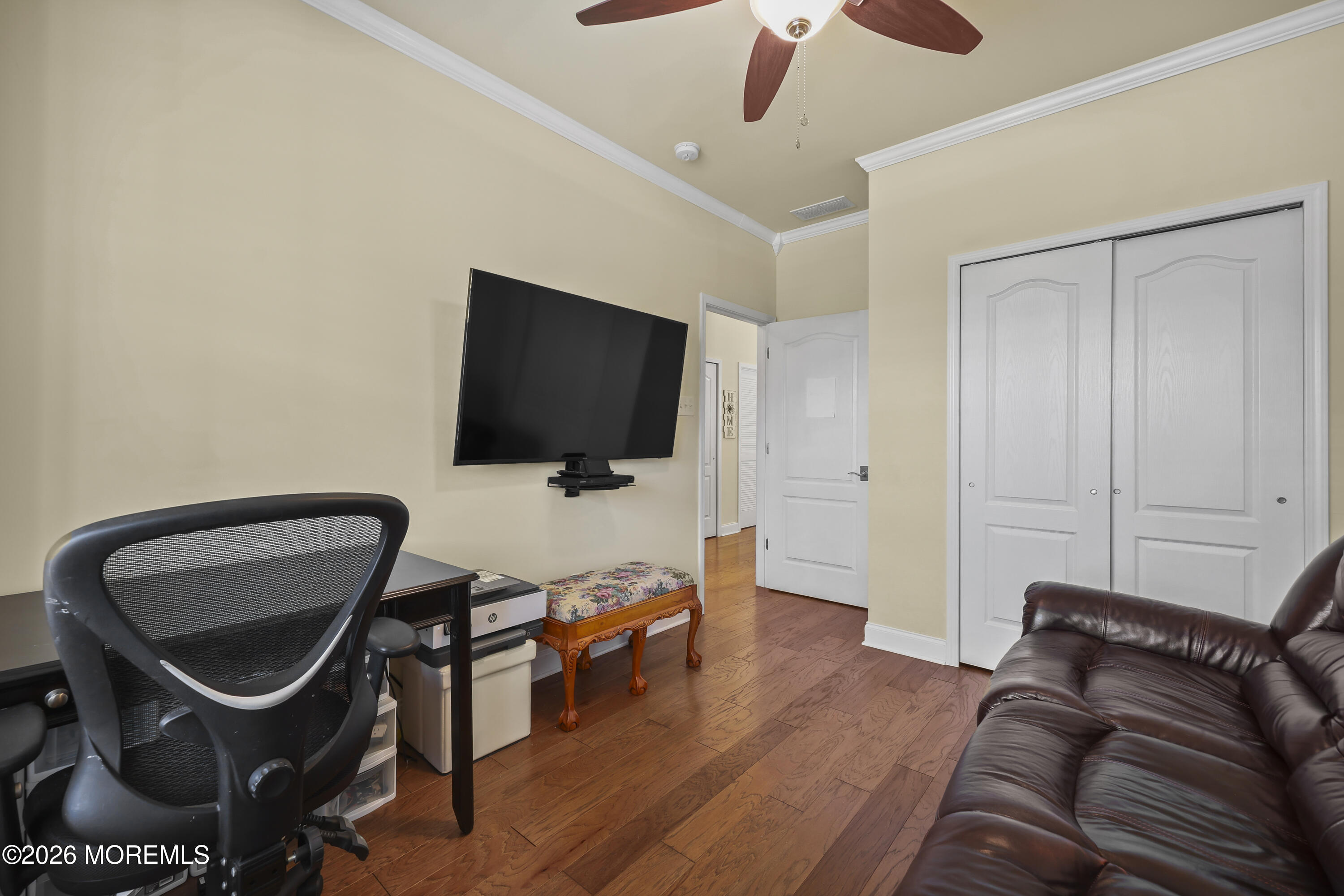 51 Mason Drive Jackson, NJ 08527 - Photo 5 of 39 a living room with furniture and a flat screen tv