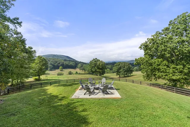 a view of a lake with a yard