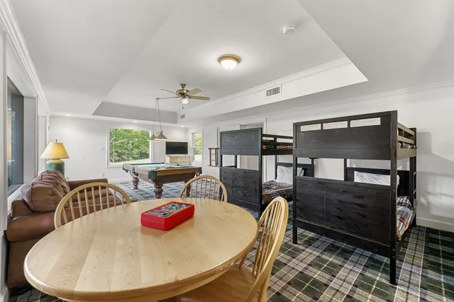 a view of a playground with a yard