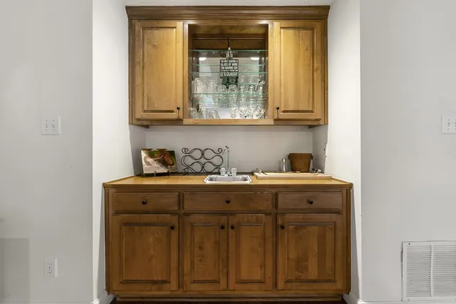 a living room with furniture fireplace and flat screen tv