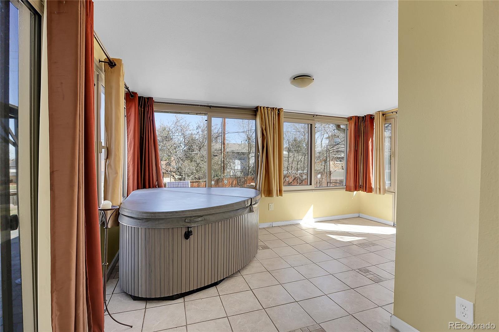 7539 East Easter Place Centennial, CO 80112 - Photo 16 of 40 a bathroom with a sink and mirror