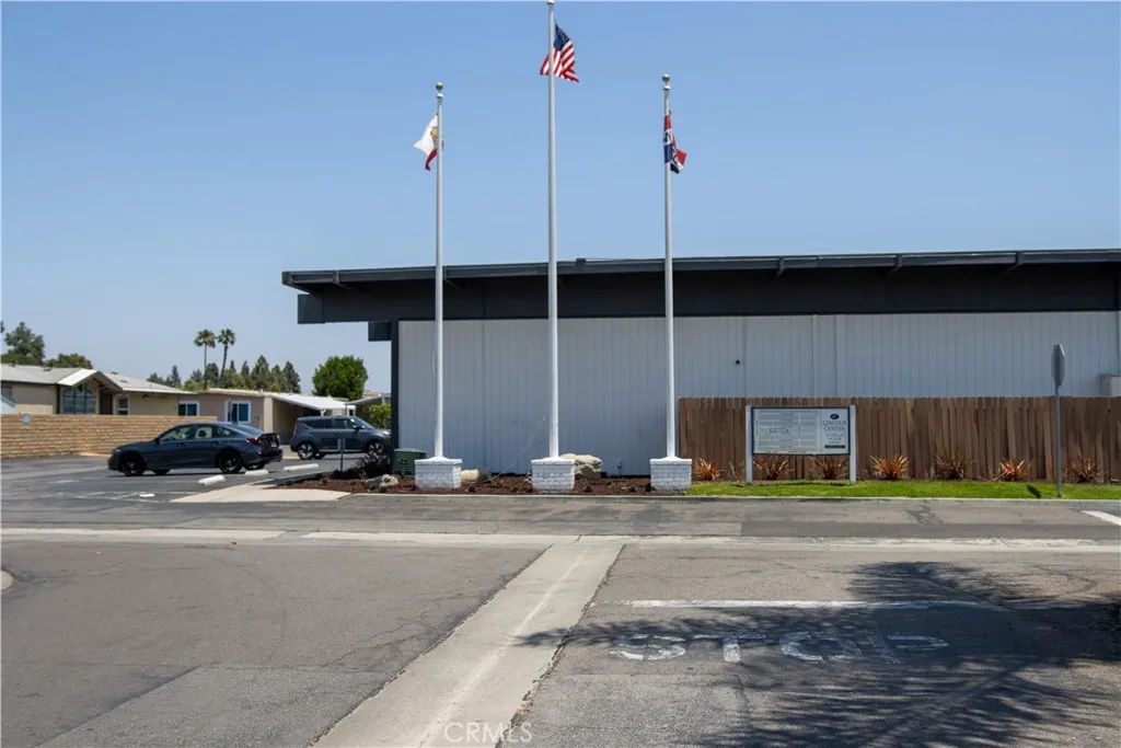 9080 Bloomfield Avenue, Unit 237 Cypress, CA 90630 - Photo 22 of 24 a car parked on the side of the road