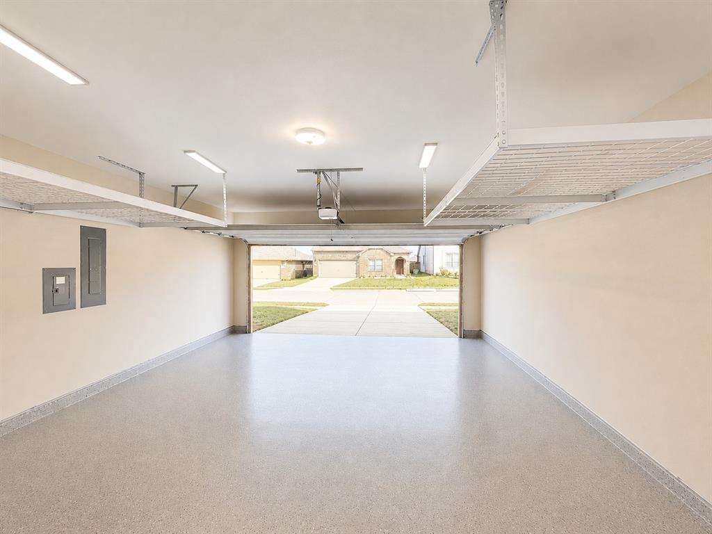 1224 Morning Ridge Trail Aubrey, TX 76227 - Photo 15 of 19 Epoxy floored 2 Car Garage