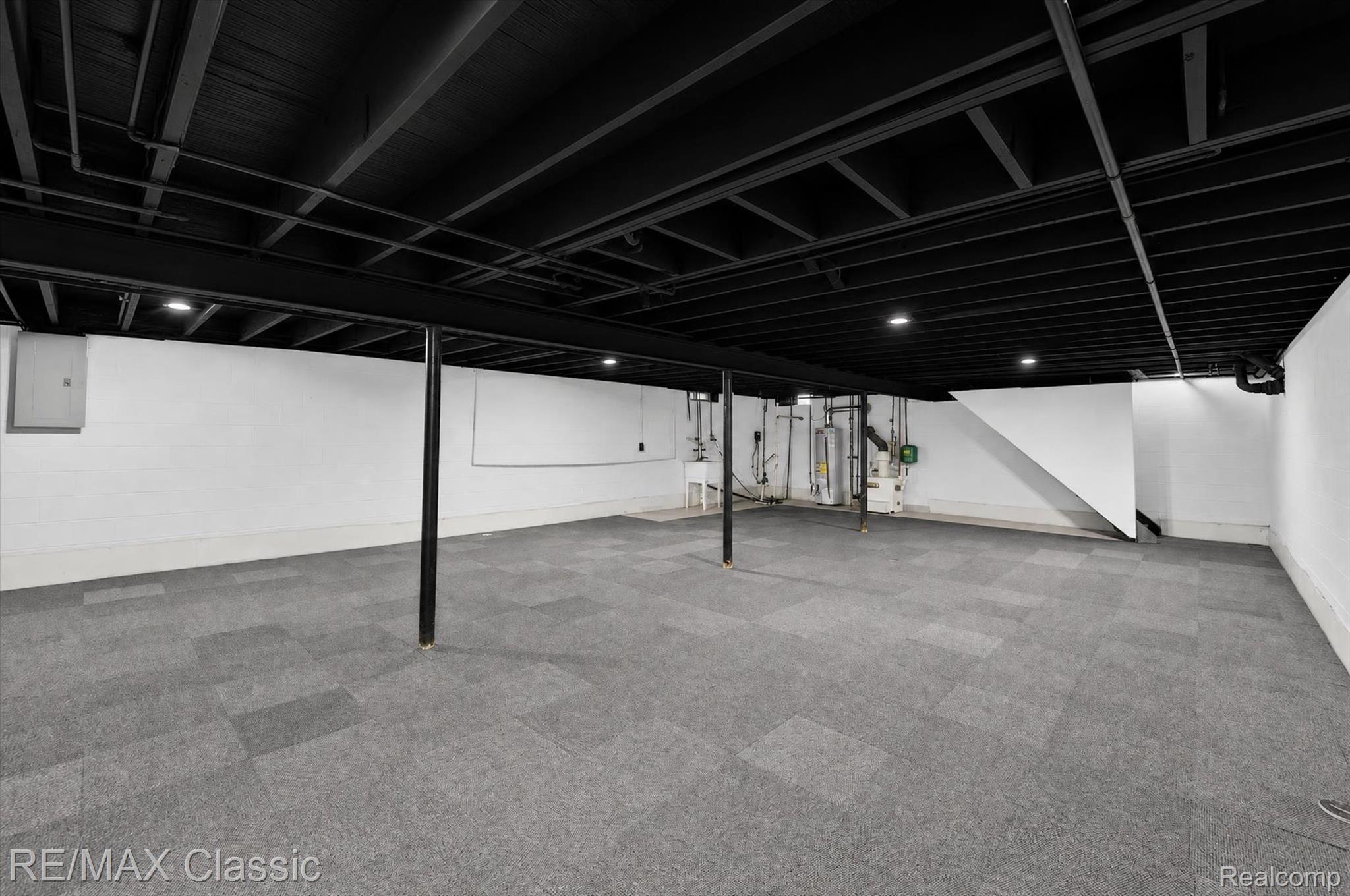 8200 Hannan Road Wayne, MI 48184 - Photo 24 of 39 Carpet tiled basement