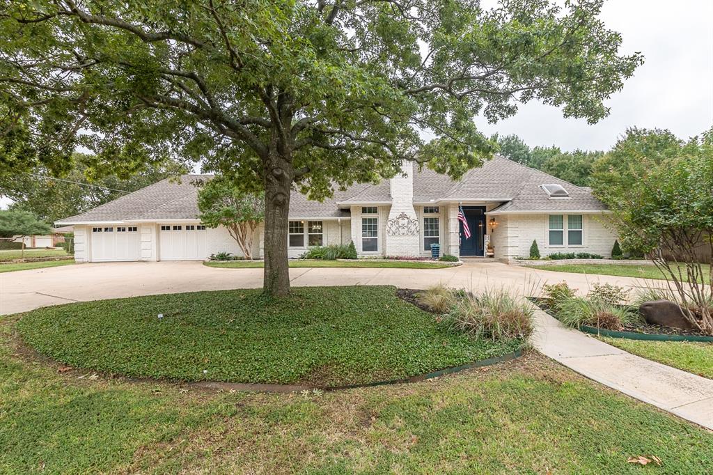 3700 Hollow Creek Road Arlington, TX 76001 - Photo 1 of 1 a front view of a house with garden
