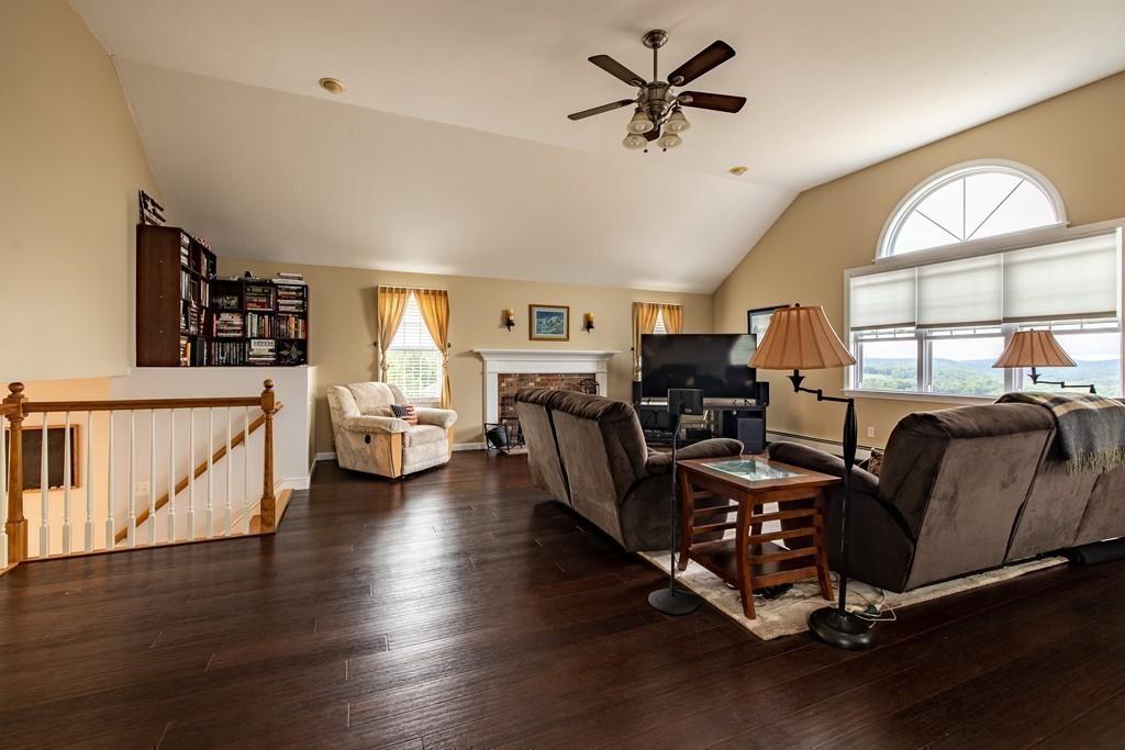 6 Carley Circle Rutland, MA 01543 - Photo 20 of 39 a living room with furniture and a large window